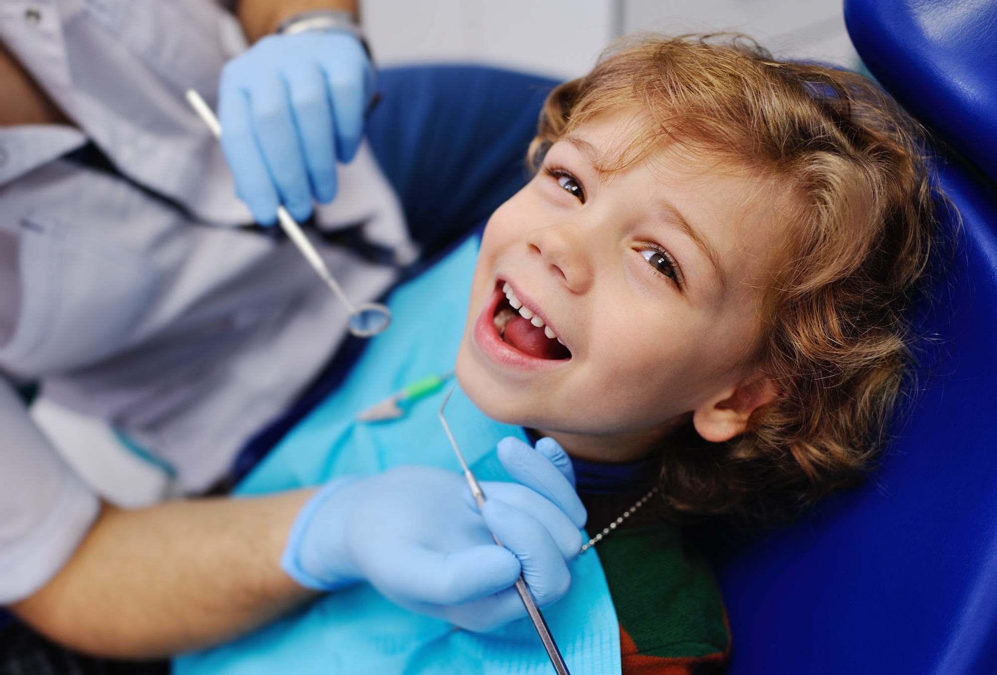 Toddler smiling during an early orthodontic evaluation at Younis Orthodontics in Martinsburg WV